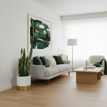 Modern living room with a gray sofa, coffee table, and decorative items.