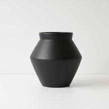 Black vase on a white background