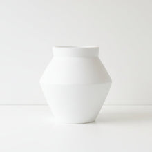 White vase on a white background