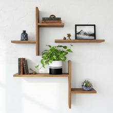 Wooden shelves with decorative items against a white wall