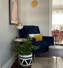 Bohemian inspired aztec planter on floor in a cozy reading nook