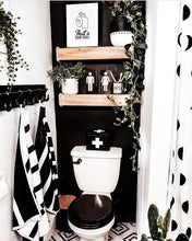 black and white boho pot in bathroom