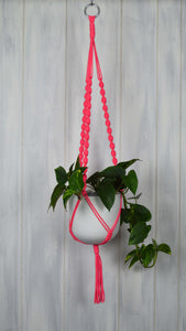 Neon Pink plant hanger with a white hand painted planter