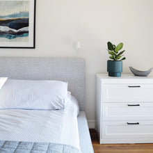 large bed with striped duvet.  Heather grey textured headboard.  Black framed artprint.  White dresser with hunter green fluted planter.  Small ficus Audrey plant.  Hand painted Boho planter pot with or without drainage hole. This decorative planter is all about style and design and looks great anywhere in the home.